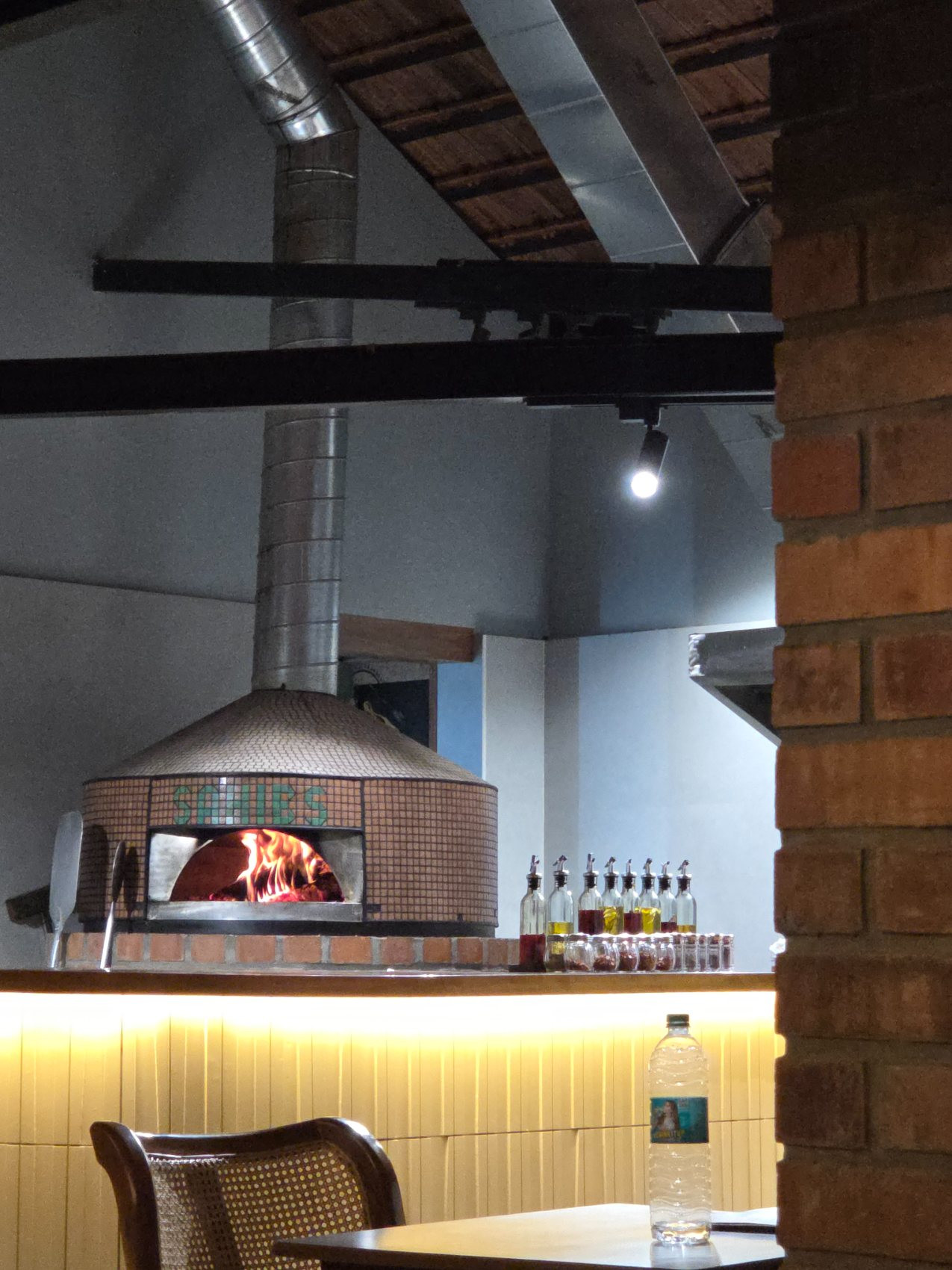The brick oven at the centre of the room