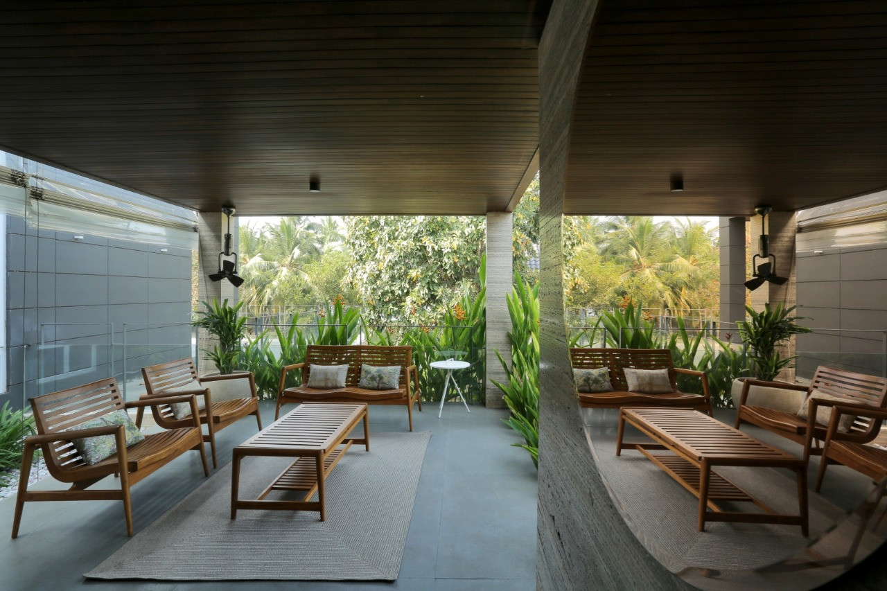 Outdoor terrace with teak lounge seating