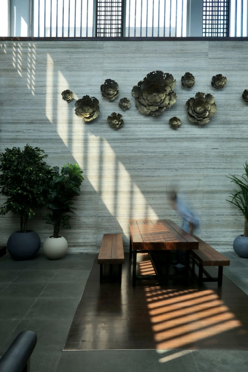 Courtyard with sculptural wall art